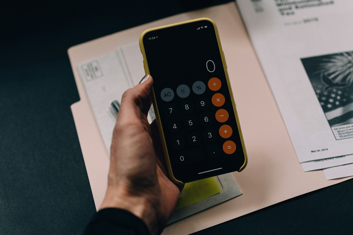 Financial calculation and real estate contract desk scene